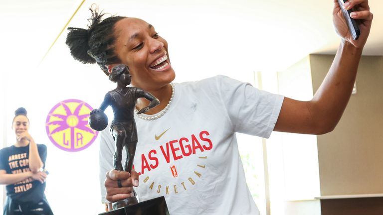A'ja Wilson strikes a pose with her WNBA 2020 MVP tropy