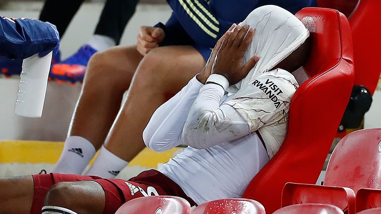 Alexandre Lacazette reacts after being substituted at Anfield