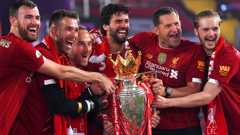 Adrian celebrates Liverpool's Premier League triumph with Alisson and the club's goalkeeping department