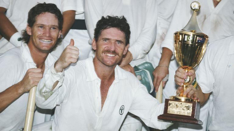Dean Jones flanks Australia captain Allan Border after the 1987 Cricket World Cup Final in Calcutta, India