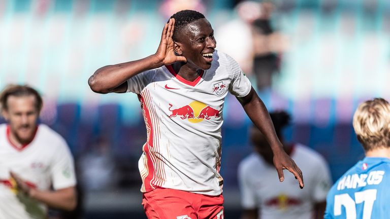 Amadou Haidara wheels away in delight after notching his goal for RB Leipzig