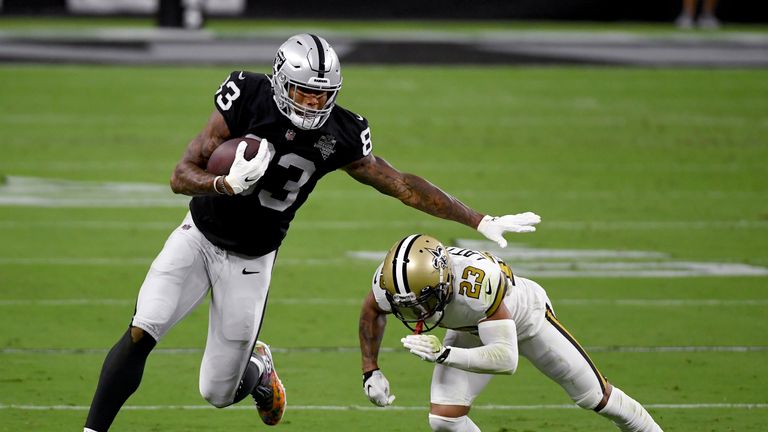 Darren Waller of the Las Vegas Raiders celebrates a touchdown with