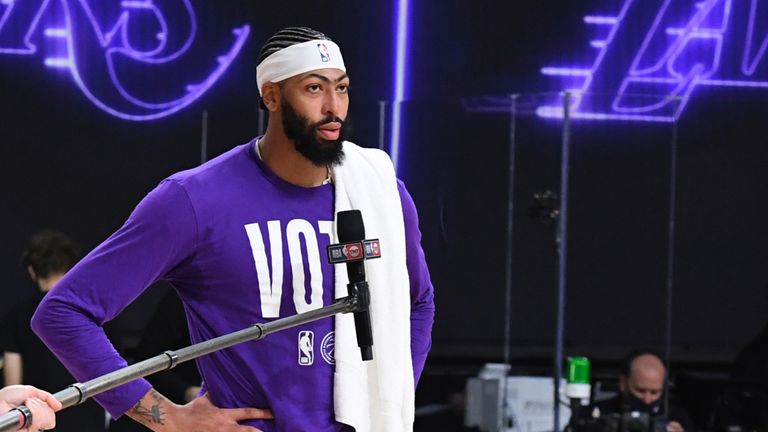 Anthony Davis of the Los Angeles Lakers talks with reporter Allie LaForce after winning Game One of the Western Conference Finals