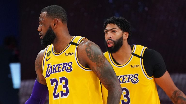 LeBron James and Anthony Davis line up on defense in the Lakers' Game 4 win over the Rockets