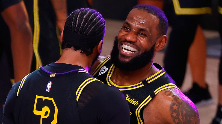 LeBron James celebrates with Anthony Davis after the Lakers' Game 2 victory
