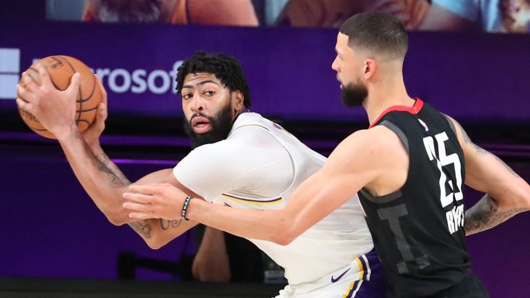 Anthony Davis is guarded by Austin Rivers during Game 5