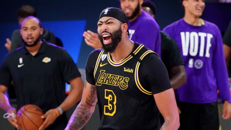 Anthony Davis celebrates after draining a three-pointer at the buzzer to earn the Lakers a 105-103 win over the Nuggets in Game 2 of the Western Conference Finals