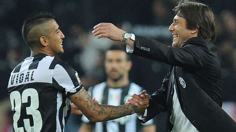 Arturo Vidal and Antonio Conte during the Serie A match Juventus FC v AC Milan at Juventus Arena on April 21, 2013 in Turin, Italy.