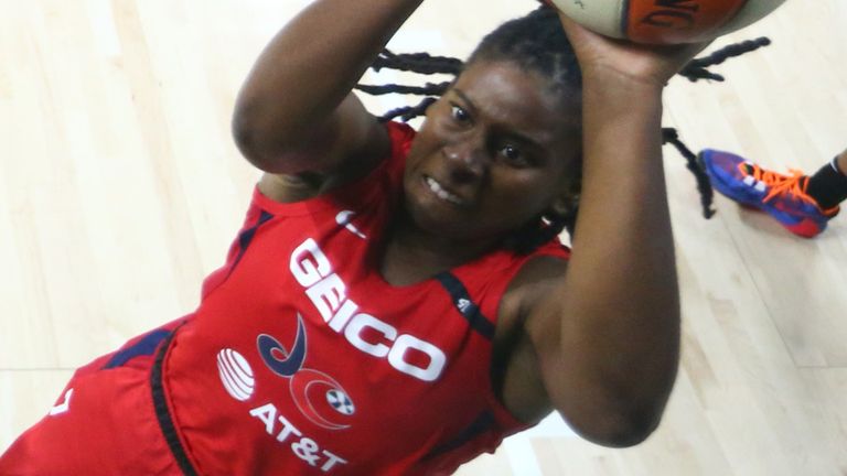 Ariel Atkins fires a jump shot against the  Atlanta Dream