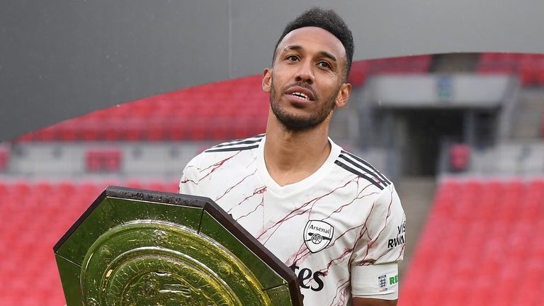 LONDON, ENGLAND - AUGUST 29: Pierre-Emerick Aubameyang with the Community Shield after the FA Community Shield match between Arsenal and Liverpool at Wembley Stadium on August 29, 2020 in London, England. (Photo by Stuart MacFarlane/Arsenal FC via Getty Images)