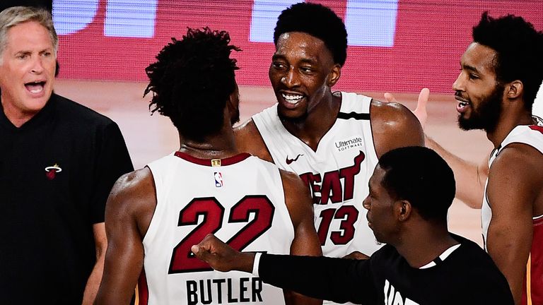 Bam Adebayo and Jimmy Butler celebrates Miami's Game 1 win over Boston