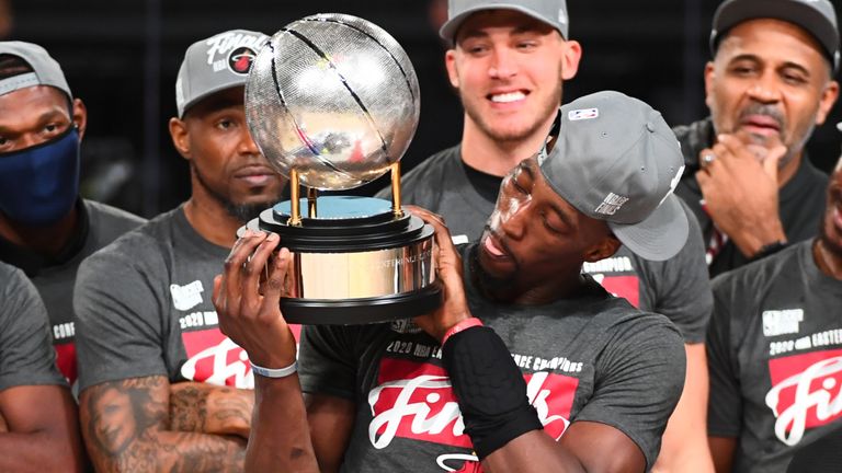 Bam Adebayo celebrates with the Eastern Conference  Finals trophy