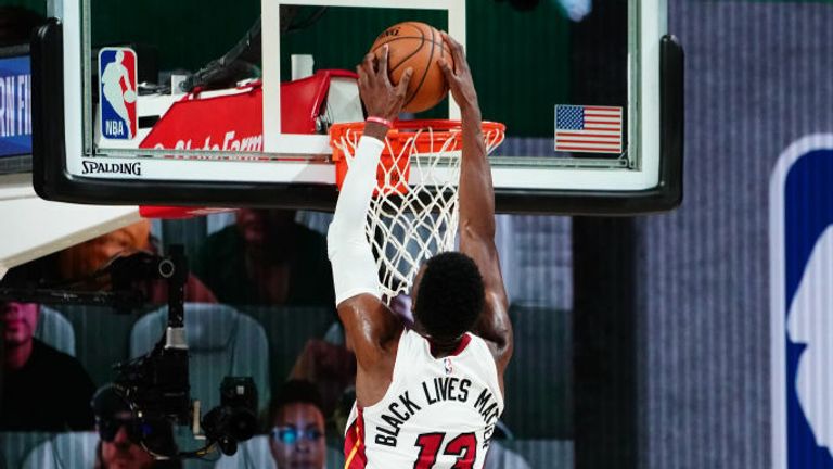 Bam Adebayo #13 of the Miami Heat dunks the ball against the Boston Celtics during Game Two of the Eastern Conference Finals of the NBA Playoffs on September 17, 2020 at the AdventHealth Arena at ESPN Wide World Of Sports Complex in Orlando, Florida.