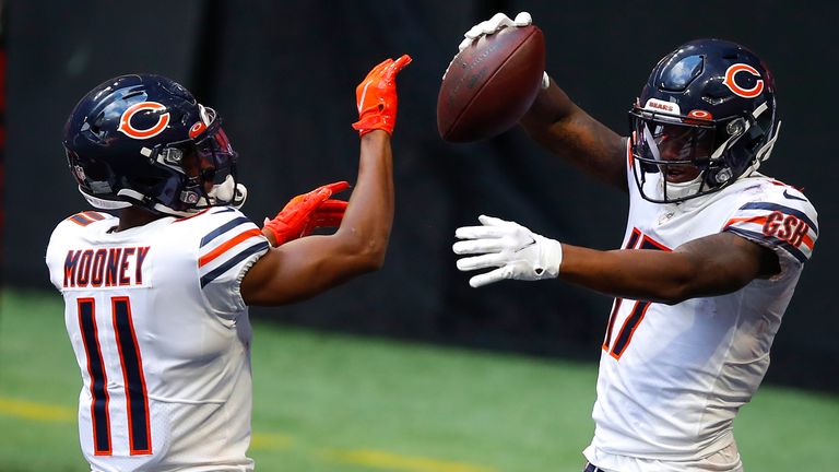 Anthony Miller #17 celebrates his touchdown with Darnell Mooney #11 of the Chicago Bears in the fourth quarter of an NFL game against the Atlanta Falcons