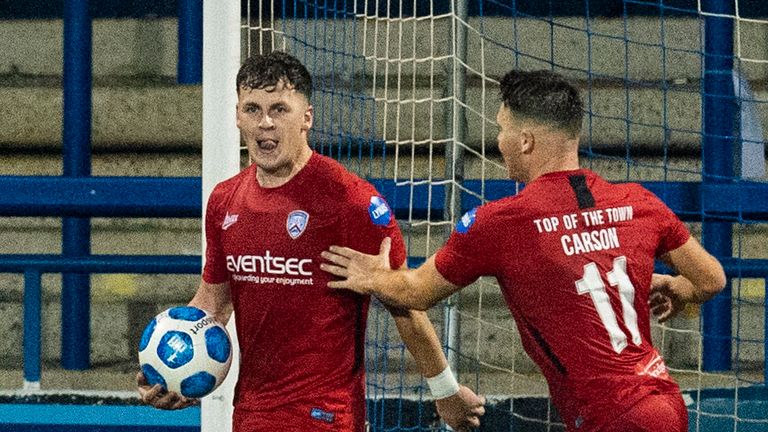 Ben Doherty celebrates netting an injury-time penalty to level for Coleraine