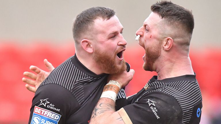 Salford Red Devils v Toronto Wolfpack - Betfred Super League - AJ Bell Stadium
Toronto Wolfpack's Brad Singleton (left) is congratulated on scoring his sides 3rd try during the Betfred Super League match at the AJ Bell Stadium, Salford.
