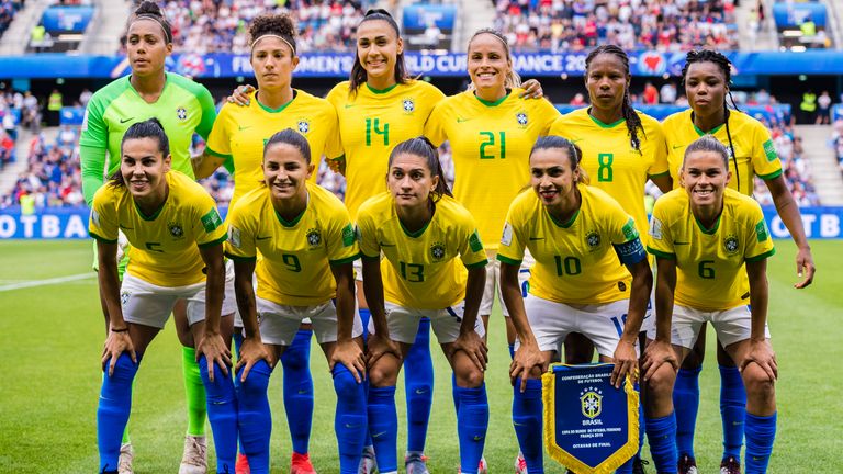 Marta (bottom row, second from right) will be paid the same as Neymar