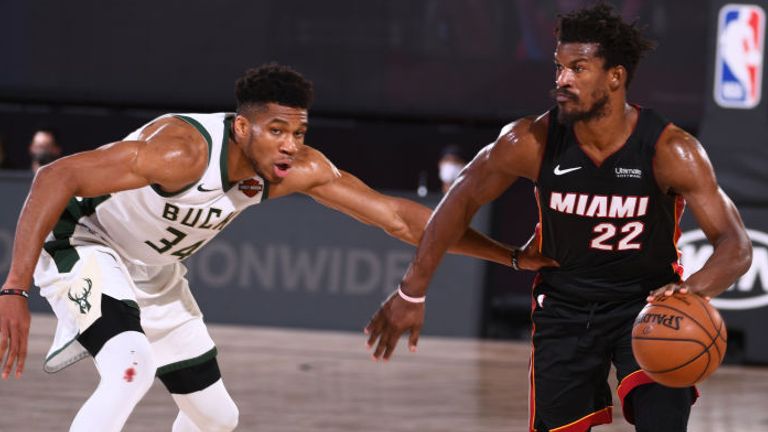 Jimmy Butler of the Miami Heat handles the ball against the Milwaukee Bucks during Game Three of the Eastern Conference Semifinals