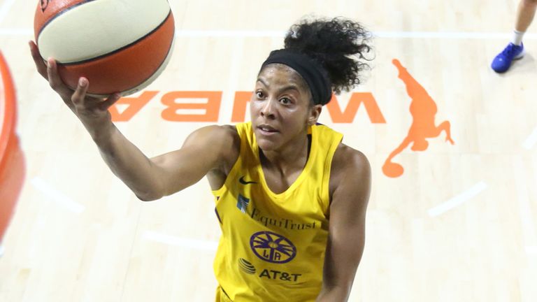 Candace Parker scores with a lay-up against the Dallas Wings