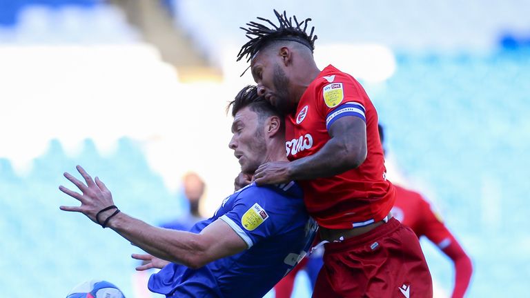 CARDIFF, WALES - SEPTEMBER 26: Kieffer Moore of Cardiff City FC and Liam Moore of Reading during the Sky Bet Championship match between Cardiff City and Reading at Cardiff City Stadium on September 26, 2020 in Cardiff, Wales. (Photo by Cardiff City FC/Getty Images)
