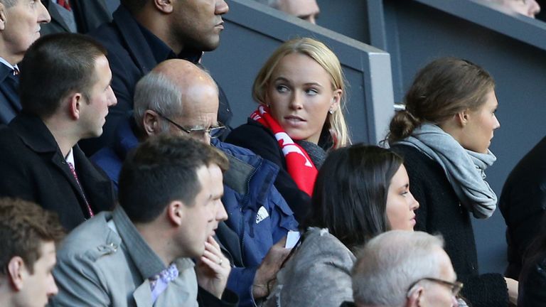 Tennis player Caroline Wozniacki looks on during the Barclays Premier League match between Liverpool and West Bromwich Albion at Anfield on October 26, 2013 in Liverpool, England