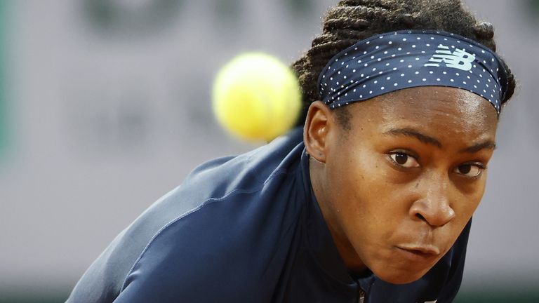 Cori Gauff of the US eyes the ball as she returns it to Britain's Johanna Konta during their women's singles first round tennis match on Day 1 of The Roland Garros 2020 French Open tennis tournament in Paris on September 27, 2020.