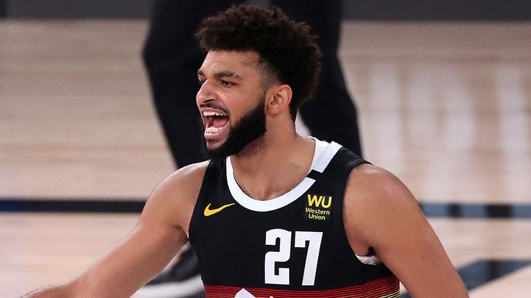 Jamal Murray celebrates with Nikola Jokic during the Denver Nuggets' Game 6 win over the LA Clippers