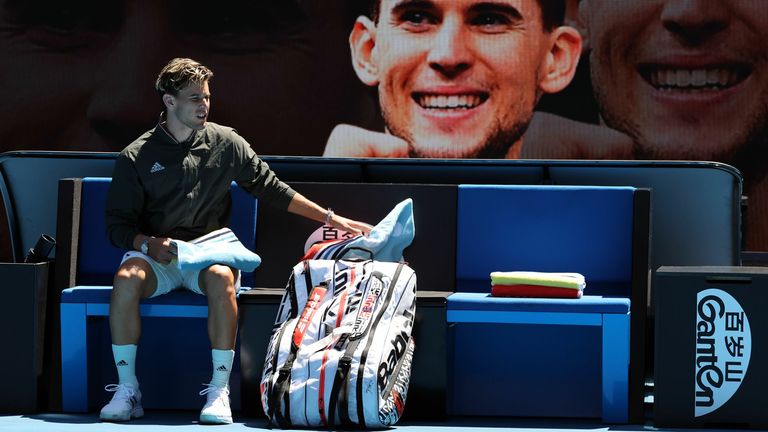 Austria's Dominic Thiem takes out his racket prior to his men's singles match against Taylor Fritz of the US on day six of the Australian Open tennis tournament in Melbourne on January 25, 2020. 