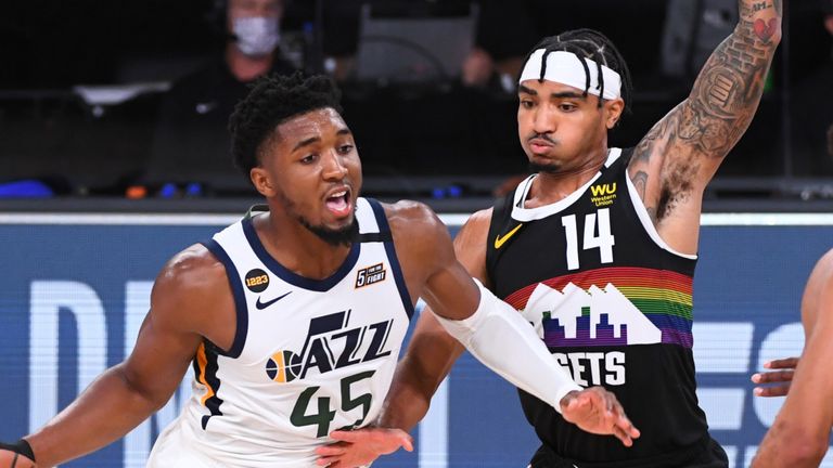 Gary Harris guards Donovan Mitchell in Game 7