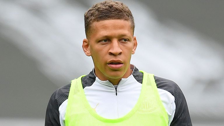 Dwight Gayle of Newcastle United warms up ahead of the Premier League match between Newcastle United and Tottenham Hotspur at St. James Park on July 15, 2020 in Newcastle upon Tyne, England. Football Stadiums around Europe remain empty due to the Coronavirus Pandemic as Government social distancing laws prohibit fans inside venues resulting in all fixtures being played behind closed doors.