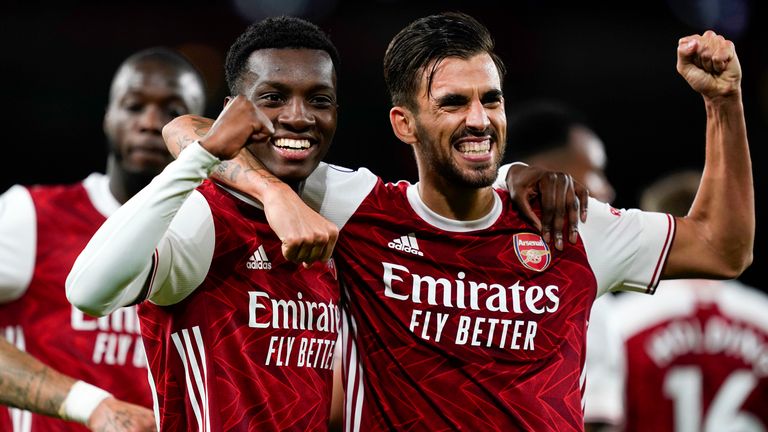 Eddie Nketiah celebrates with Dani Ceballos after scoring the goal of Arsenal's goal