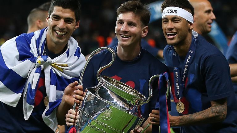 Luis Suarez, Lionel Messi and Neymar with the Champions League trophy in 2015