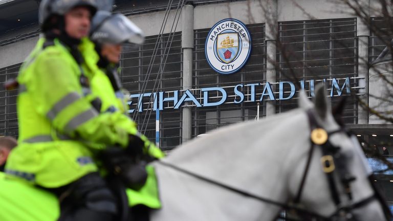 Police outside Manchester City's Etihad Stadium