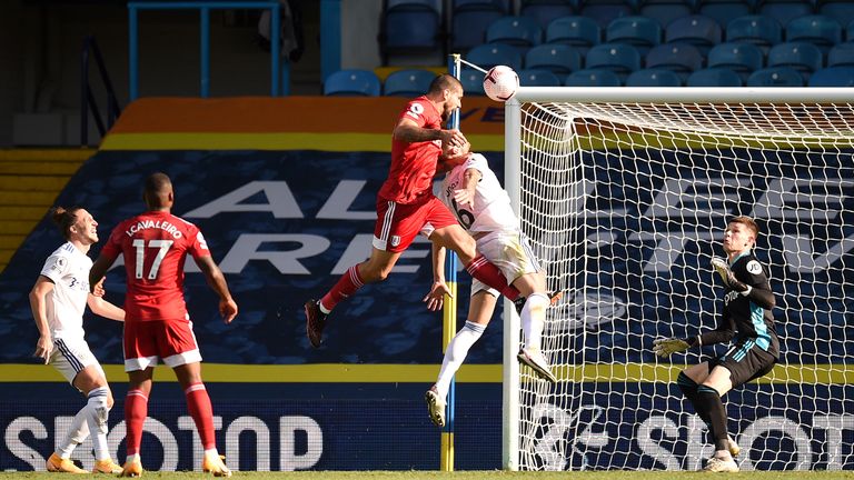 Aleksandar Mitrovic heads in Fulham's third goal at Leeds