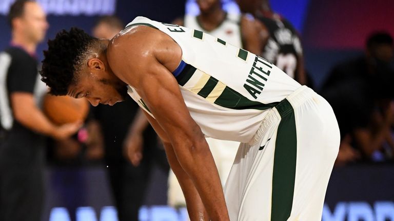 Giannis Antetokounmpo looks dejected during the Bucks' Game 1 loss to the Heat
