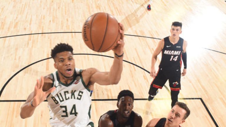Giannis Antetokounmpo of the Milwaukee Bucks drives to the basket against the Miami Heat during Game Three of the Eastern Conference Semifinals 
