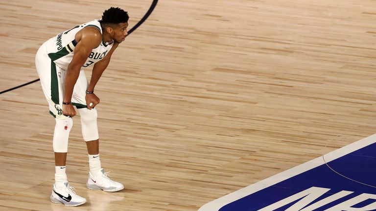 Giannis Antetokounmpo of the Milwaukee Bucks on the court during the fourth quarter against the Miami Heat in Game Three of the Eastern Conference semi-finals