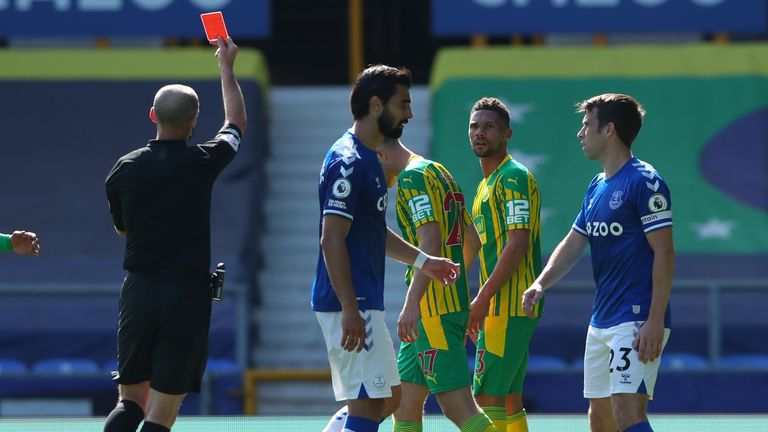 Referee Mike Dean sends off Kieran Gibbs