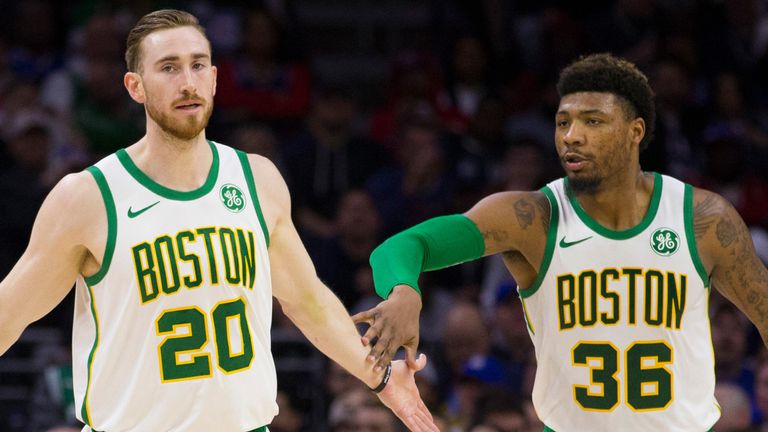 Gordon Hayward is congratulated by Celtics team-mate Marcus Smart