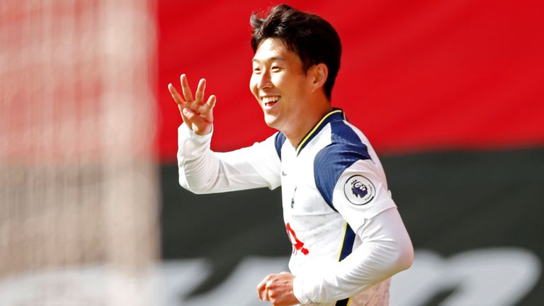 Heung-Min Son holds up four fingers after scoring his and Spurs' fourth goal of the game