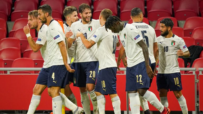 Italy players celebrate Nicolo Barella's goal