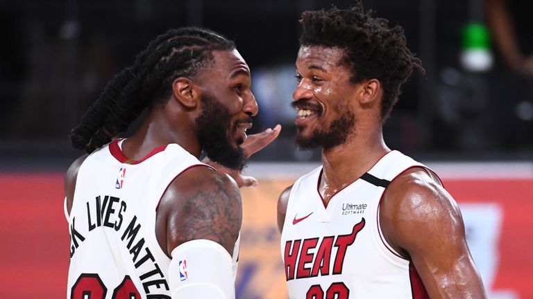 Jae Crowder and Jimmy Butler celebrate following the Heat&#39;s Game 2 win