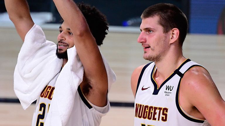 Jamal Murray and Nikola Jokic celebrate the Denver Nuggets&#39; Game 7 victory over the LA Clippers