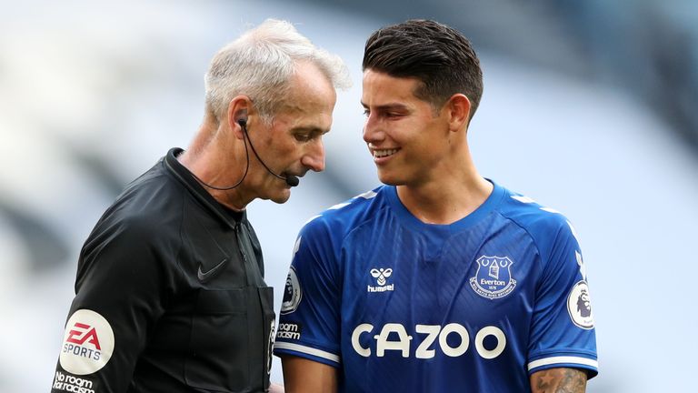 James Rodriguez speaks to referee Martin Atkinson during the encounter