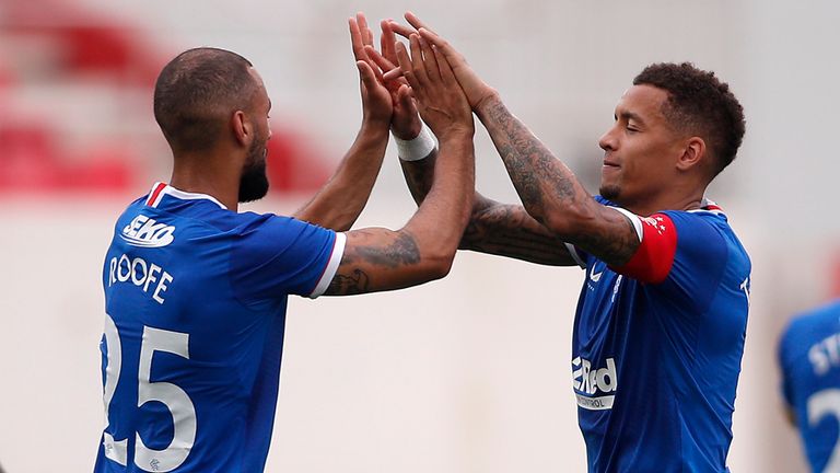James Tavernier celebrates scoring for Rangers against Lincoln Red Imps with Kemar Roofe