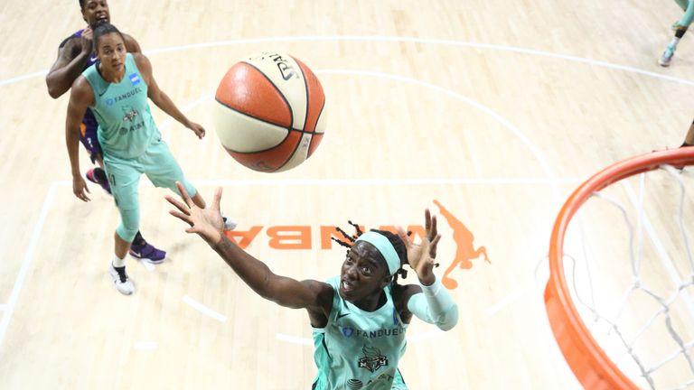 Jazmine Jones of the New York Liberty goes up for a rebound during the game against the Phoenix Mercury