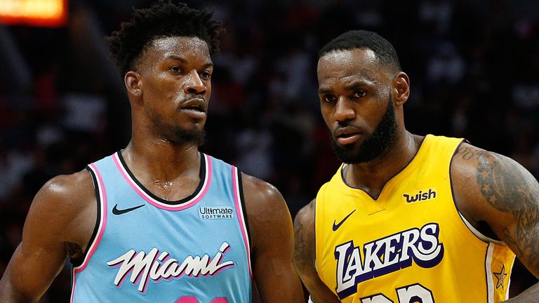 Jimmy Butler and LeBron James pictured together on court for the Miami Heat and Los Angeles Lakers