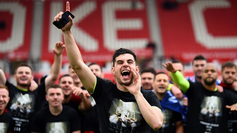 John Egan leads the Sheffield United fans in song at Stoke in the final game of their promotion season