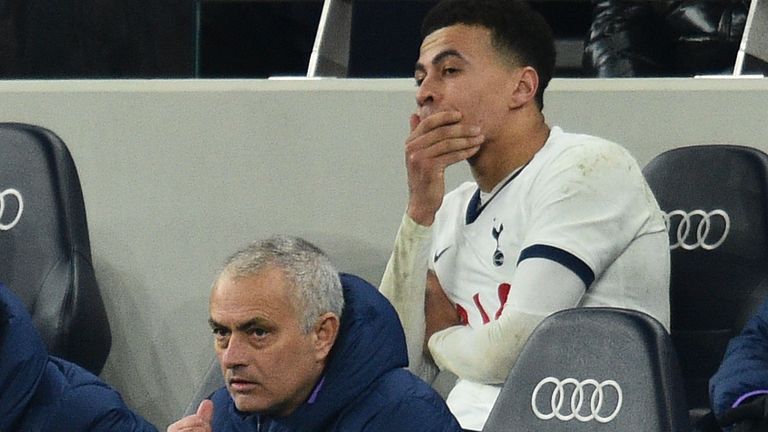 Tottenham Hotspur's English midfielder Dele Alli (up) and Tottenham Hotspur's Portuguese head coach Jose Mourinho watches the English FA Cup fifth round football match between Tottenham Hotspur and Norwich City at Tottenham Hotspur Stadium in London, on Match 4, 2020. 