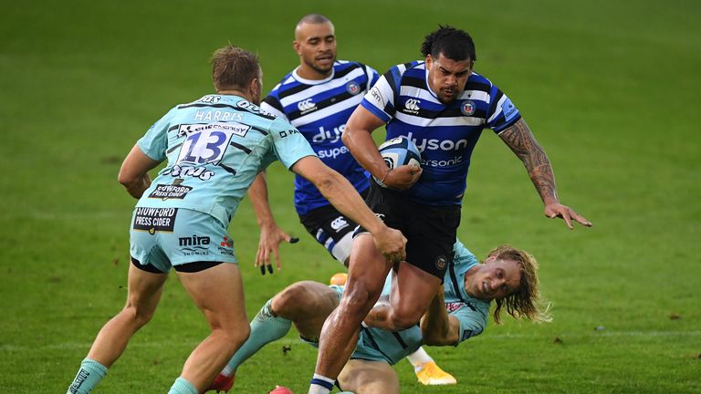 Josh Matavesi is tackled by Billy Twelvetrees